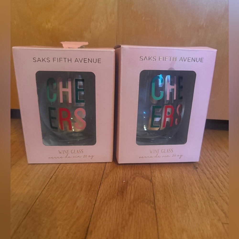Set of two Saks Fifth Avenue wine glasses.